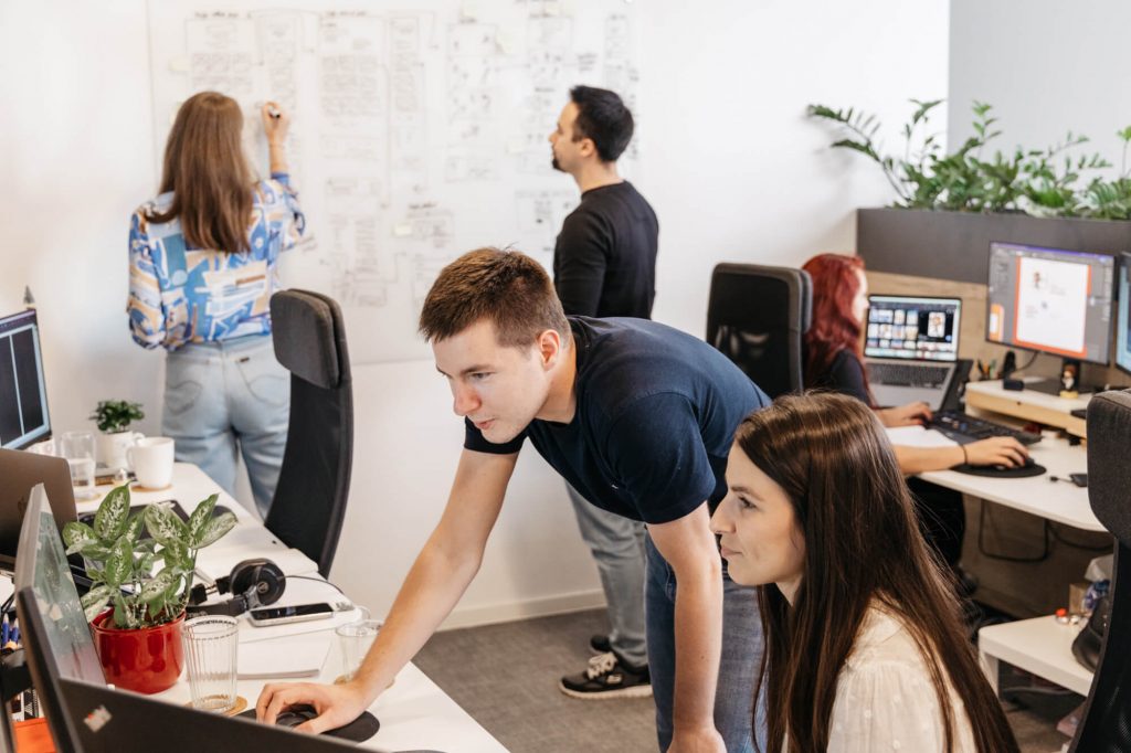 Employees working on projects.